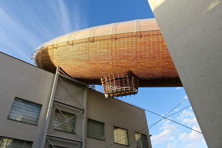 A zeppelin seems to be stranded on the DOX art gallery. In reality this is a space for events on top of the roof.
